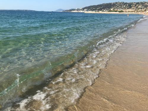 a view of the beach from the shore at Vue Mer Juan les Pins in Antibes