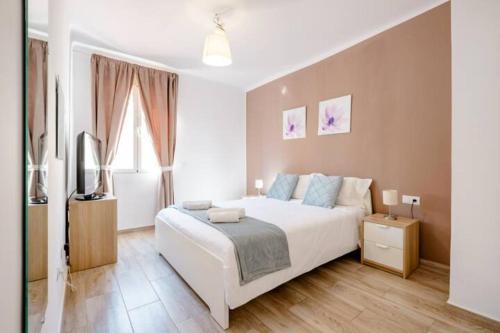 Posteľ alebo postele v izbe v ubytovaní Apartamento Fuentecilla Céntrico