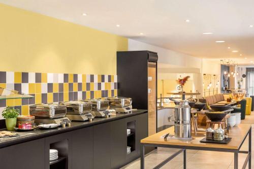 Kuchyň nebo kuchyňský kout v ubytování Vienna House Easy by Wyndham Coburg