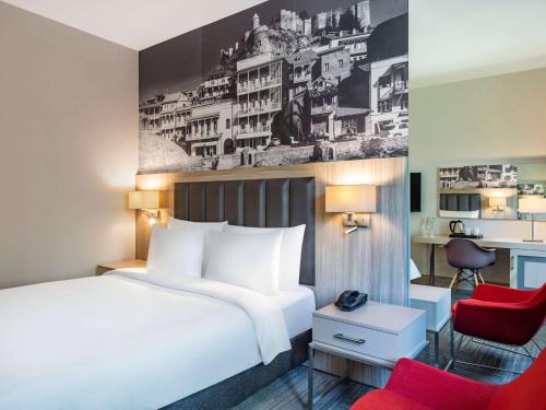 Кровать или кровати в номере Tbilisi Saburtalo Hotel by Mercure