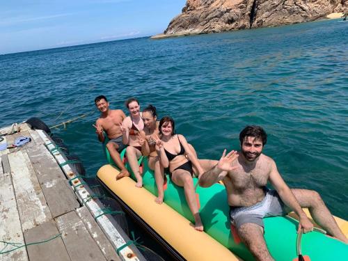 a group of people on a raft in the water at Sông Suối Homestay in Quy Nhon