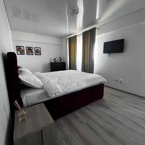 Llit o llits en una habitació de Amangani Rooms