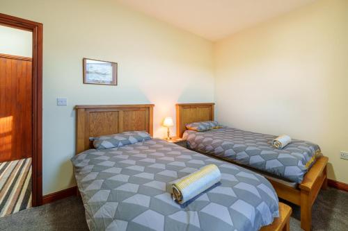 Säng eller sängar i ett rum på Farm Cottage - Kirkby-In-Furness, ideal for the Central Lake District