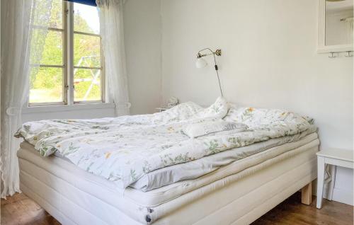 Postelja oz. postelje v sobi nastanitve 2 Bedroom Amazing Home In Vimmerby