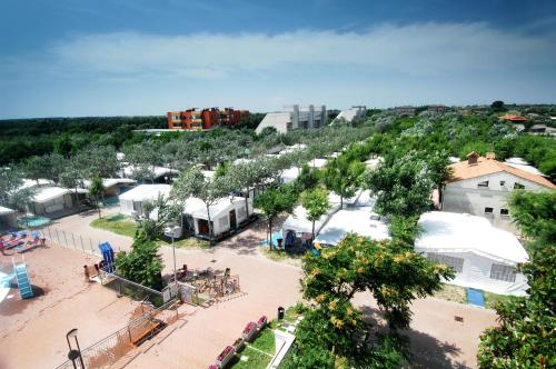 an aerial view of a town with tents and trees at Camping Internazionale - Sottomarina di Chioggia in Chioggia