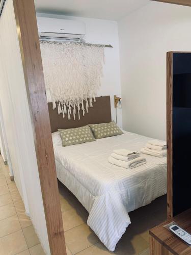 Postel nebo postele na pokoji v ubytování Complejo Sol - Departamento 4