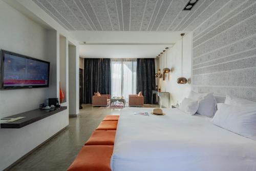 Postel nebo postele na pokoji v ubytování Cesar Resort & Spa