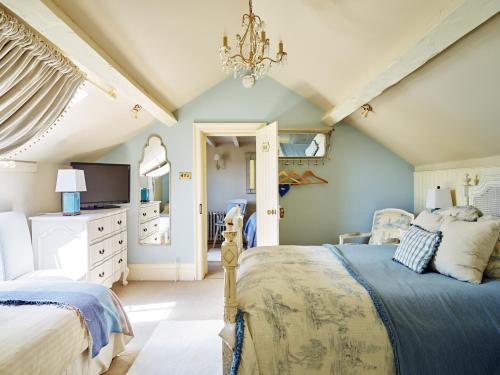 Ένα ή περισσότερα κρεβάτια σε δωμάτιο στο Willington Lodge