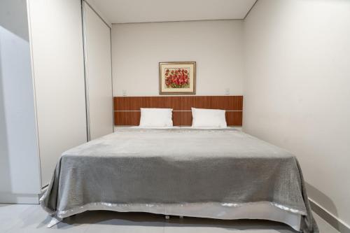 Postel nebo postele na pokoji v ubytování VIVARIUM APART HOTEL