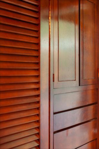 a pair of wooden doors in a room at Frenchman's Cove Resort in Port Antonio
