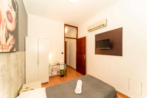 Hotel Cristallo Torinoにあるテレビまたはエンターテインメントセンター