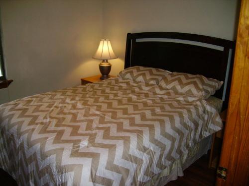 Una cama o camas en una habitación de Oakhaven