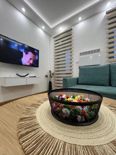 a living room with a large bowl on a table at Apartman Babin in Zlatibor