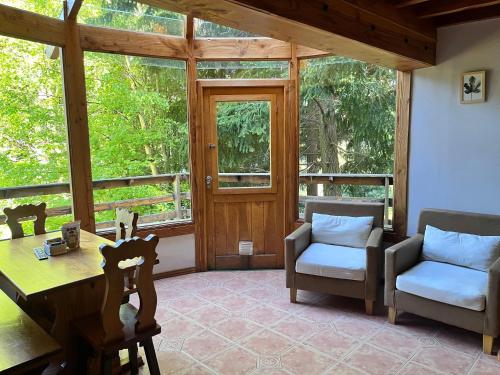Χώρος καθιστικού στο BOG Le Pommier - Cabañas con vista al lago y piscina climatizada