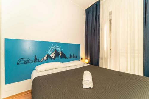 Hotel Cristallo Torinoにあるベッド