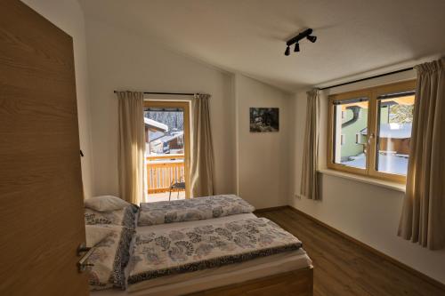 Postel nebo postele na pokoji v ubytování Haus Timmler