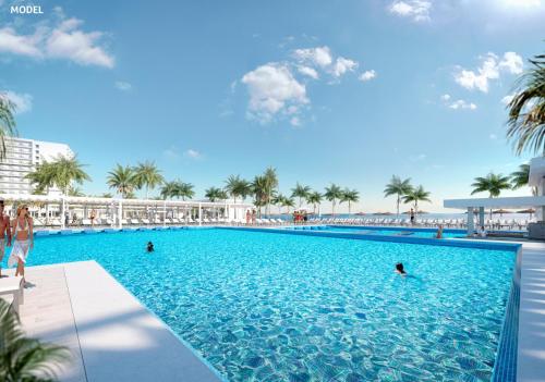 uma imagem de uma piscina num resort em Riu Palace Aquarelle - All Inclusive em Falmouth