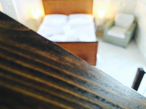 Postel nebo postele na pokoji v ubytování Agriturismo La Palascìa Masseria Agreste