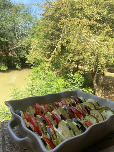a tray of food sitting on top of a table at Gîte le Moulin Samsara in Homps