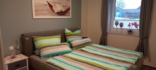 Кровать или кровати в номере Ferienwohnung Völkner