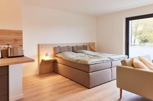 Ένα ή περισσότερα κρεβάτια σε δωμάτιο στο Bocksberg