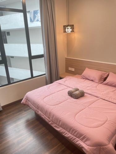 Katil atau katil-katil dalam bilik di Rex apartment 3room