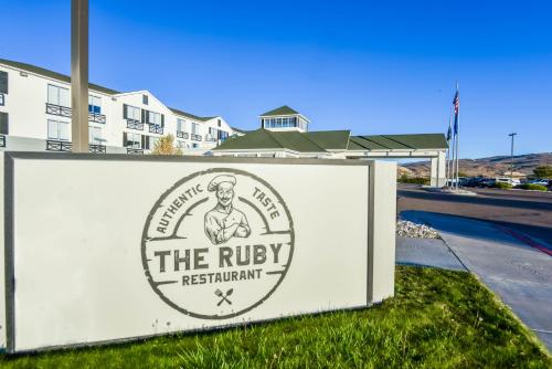 a sign for the ryley restaurant on the side of a road at Shutters Hotel in Elko