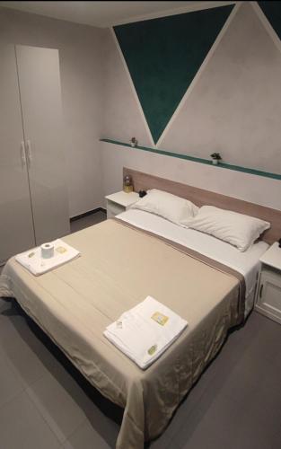Letto o letti in una camera di Eden guest house