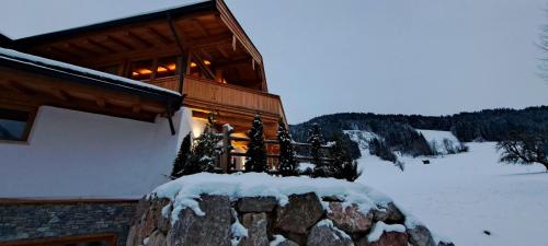 L'établissement Das Kaiserwohl Chalet en hiver