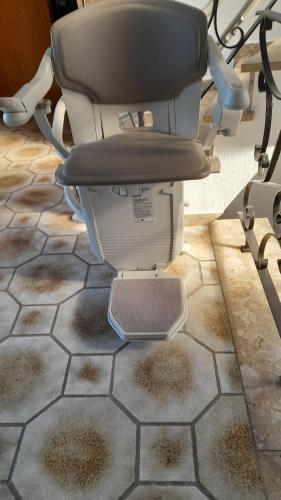 a toilet sitting on top of a tile floor at Ferienwohnung Aue Deußen in Erftstadt