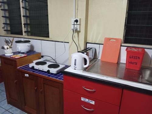 Una cocina o cocineta en Mishra Residence