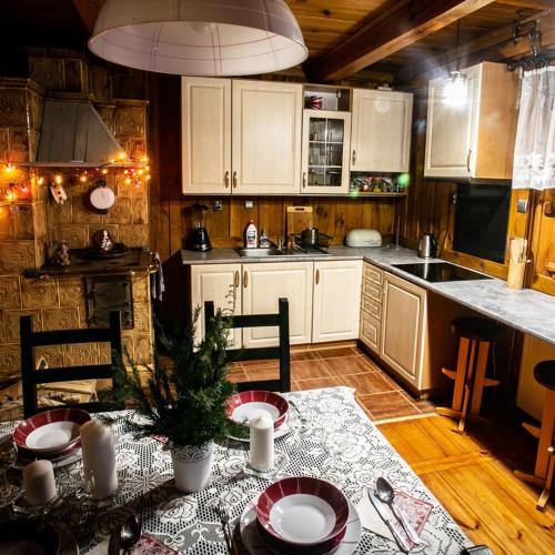 Dapur atau dapur kecil di Ranczo w lesie - domki z jacuzzi