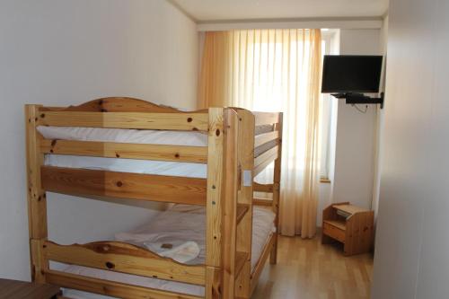 Postel nebo postele na pokoji v ubytování Hôtel de la Gare