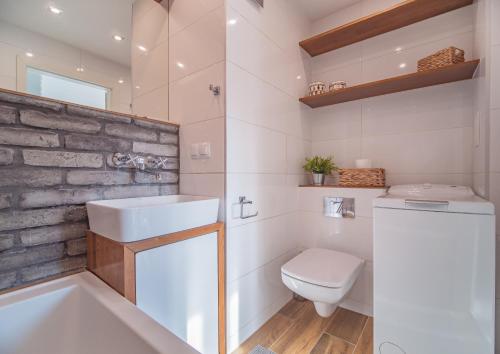 Koupelna v ubytování Bianco Apartament