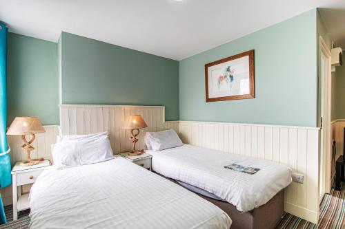 The Clarendon Hotelにあるベッド