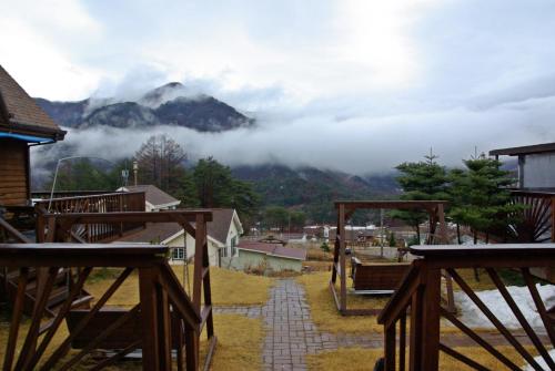 a view of a town with a mountain in the background at Cabin Liun in Pyeongchang