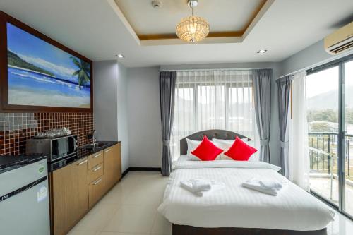 Katil atau katil-katil dalam bilik di The Lucky Beach Ao Nang