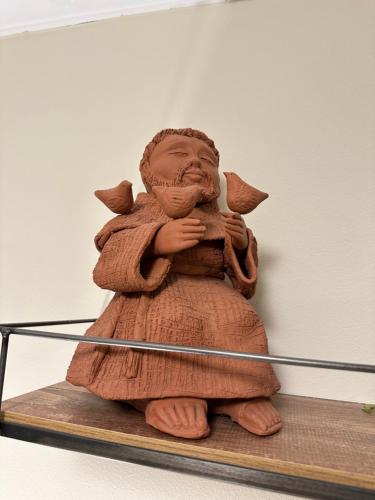 a stuffed animal is sitting on a shelf at Comfortable & Economic Acqua Village in Brasilia