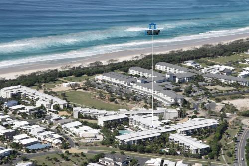 an aerial view of a resort near the beach at Pool View Apartments - Wing 5 - at Peppers Salt Resort by uHoliday 2BR 1BR and Hotel Room Options Available in Kingscliff