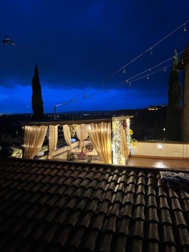 a view from the roof of a building at night at Castellino di Malborghetto in Montelupo Fiorentino