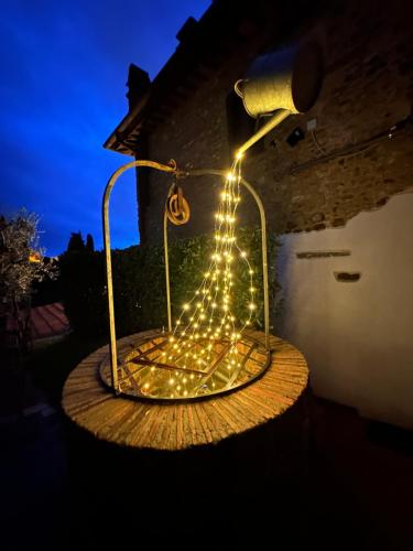 a light up table with lights on it at night at Castellino di Malborghetto in Montelupo Fiorentino