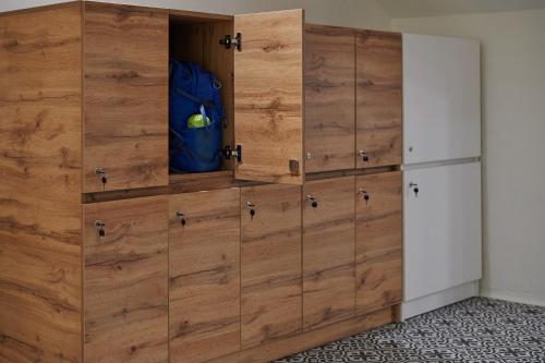 a room with wooden chests of drawers at Lama Hostel in Ivano-Frankivsʼk