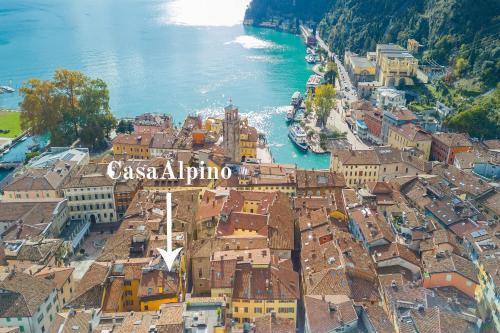 an aerial view of a town next to the water at Casa Alpino - Happy Rentals in Riva del Garda