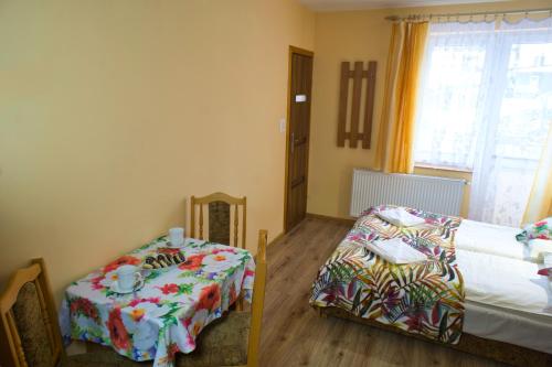 Postel nebo postele na pokoji v ubytování Dobra Miejscówka