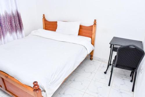 Кровать или кровати в номере Davis Homes