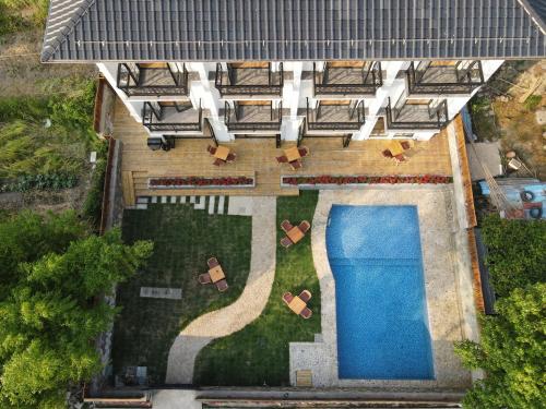 an aerial view of a resort with a swimming pool at La Petronilla Boutique Hotel Moganshan in Deqing