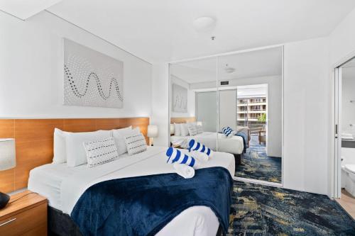 Katil atau katil-katil dalam bilik di Belle Escapes - 405 Harbour Lights