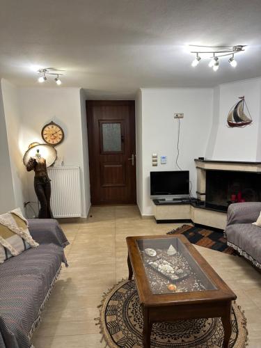 a living room with a couch and a coffee table at Coast Horizon in Romanós