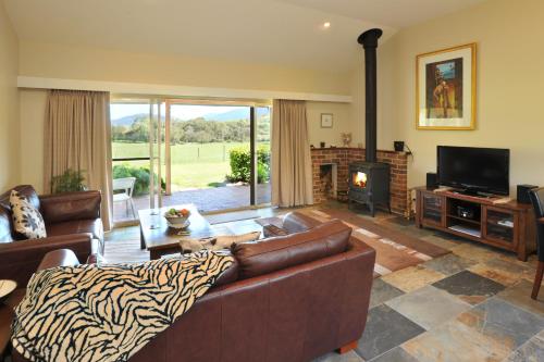 A seating area at Langbrook Cottages