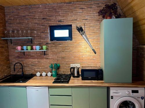 Una cocina o zona de cocina en Memoria Kazbegi